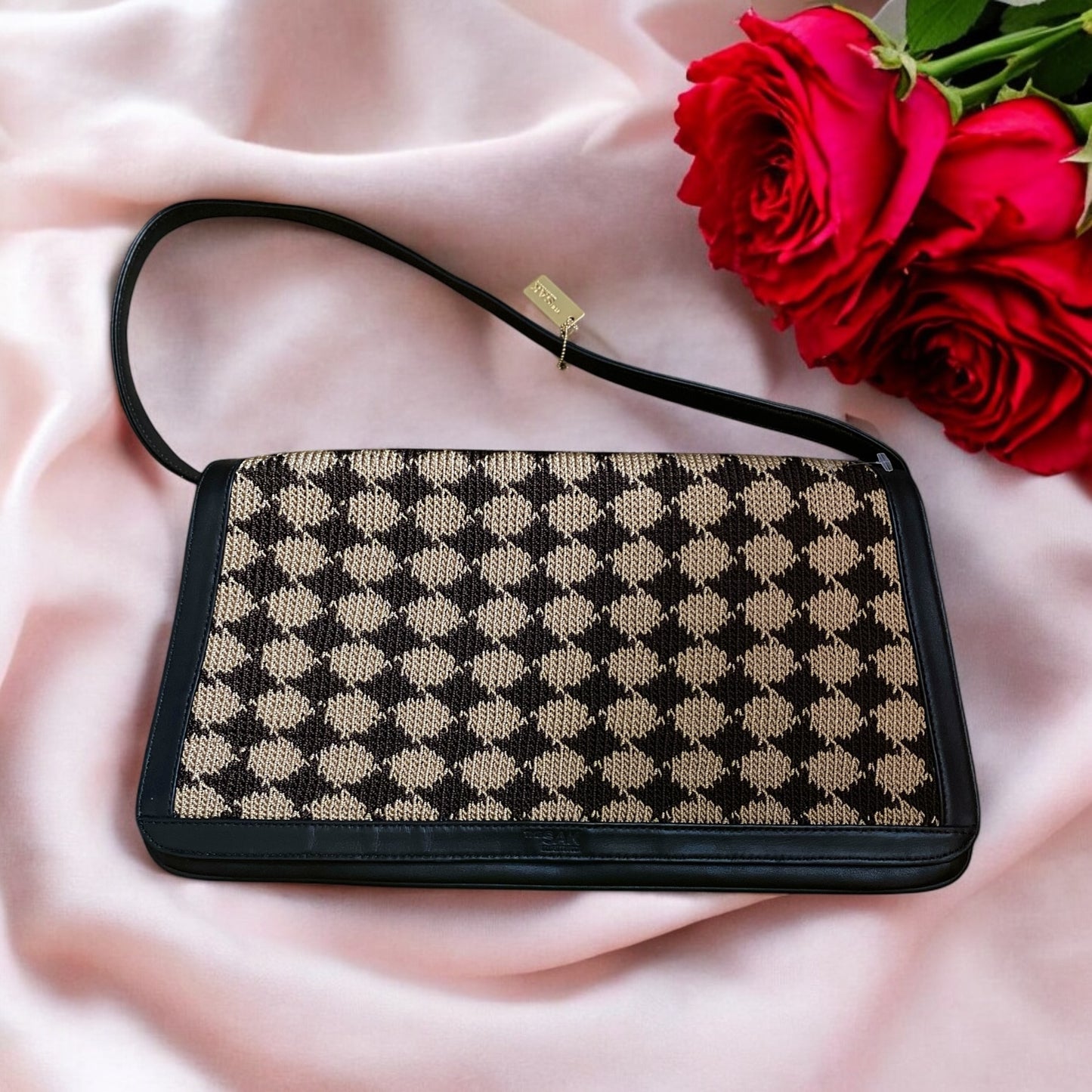 Sak’s Sweater Clutch